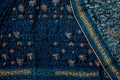Handcrafted Ajrakh Print Saree in Teal Blue with Floral Embroidery Highlights