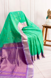 Graceful Green Silk Cotton Saree with Lavender Zari Border & Elegant Detailing
