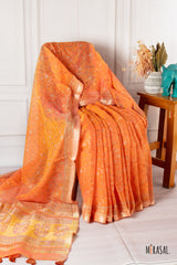Burnt Orange Chanderi Cotton Saree with Floral Motifs and Gold Zari Border