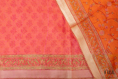 Burnt Orange Chanderi Cotton Saree with Floral Motifs and Gold Zari Border