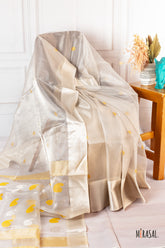 Ivory Soft Tissue Saree with Gold Butta Motifs and Subtle Zari Border
