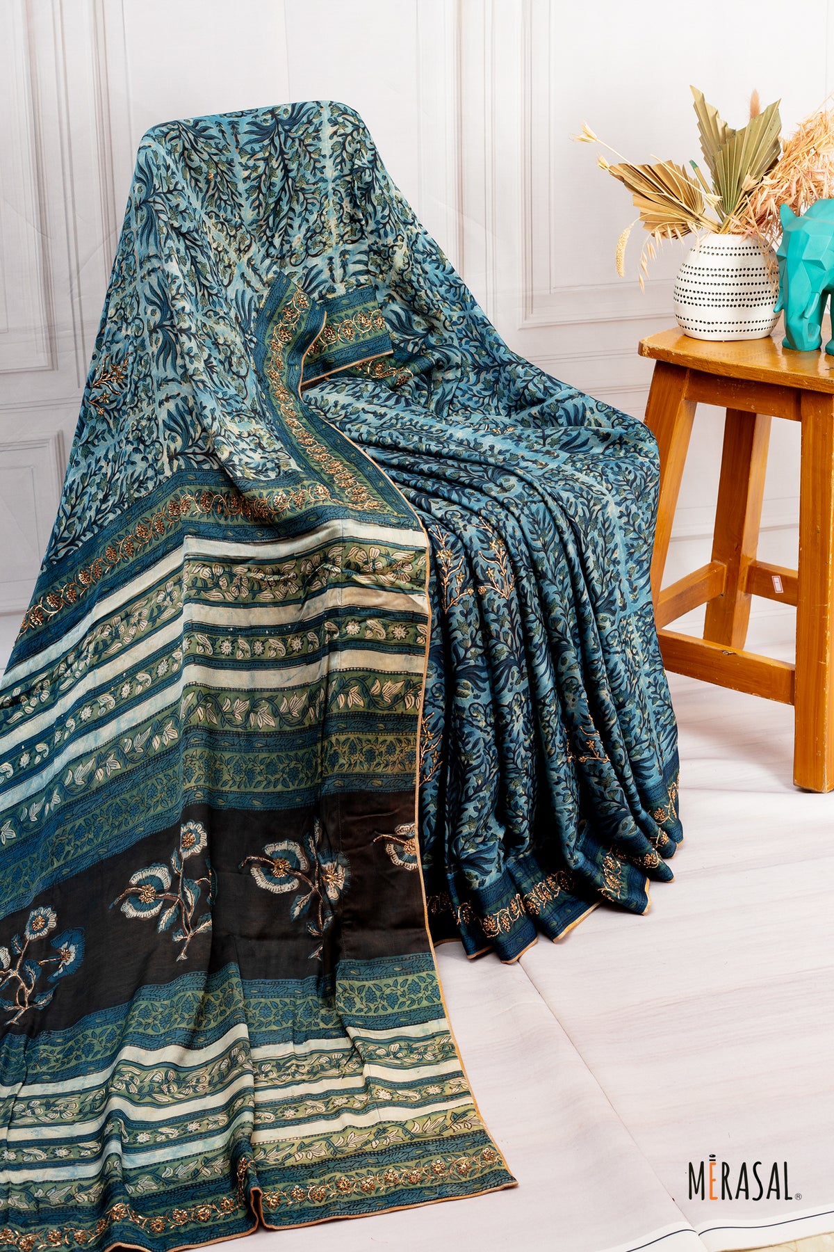 Handcrafted Ajrakh Print Saree in Teal Blue with Floral Embroidery Highlights