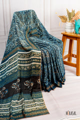 Handcrafted Ajrakh Print Saree in Teal Blue with Floral Embroidery Highlights