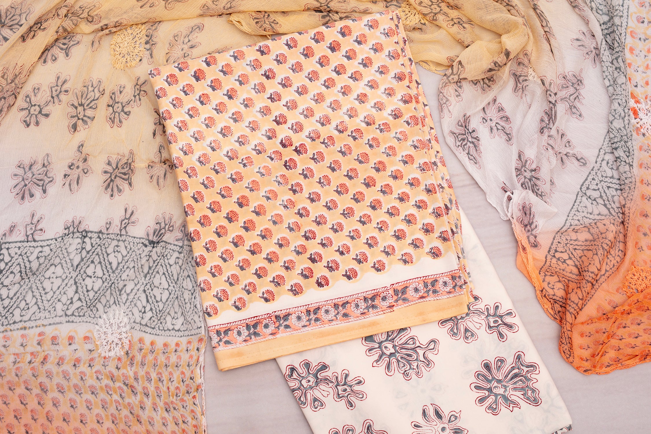 Cotton Unstitched Suit Set – Floral Elegance in orange & Cream white