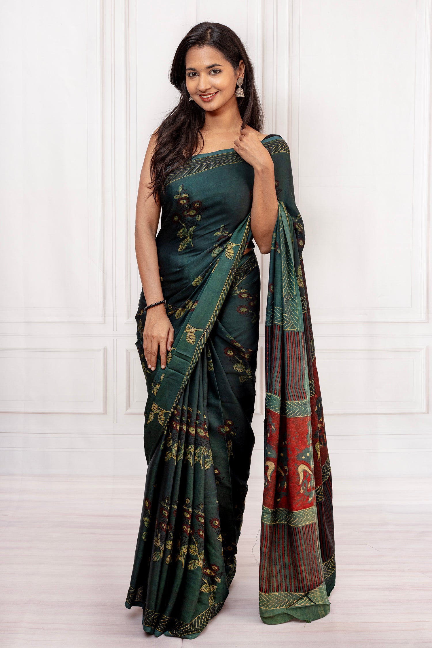 Elegant Handcrafted Dark Green Saree with Intricate Prints