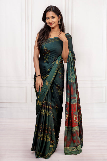 Elegant Handcrafted Dark Green Saree with Intricate Prints