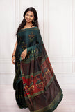 Elegant Handcrafted Dark Green Saree with Intricate Prints