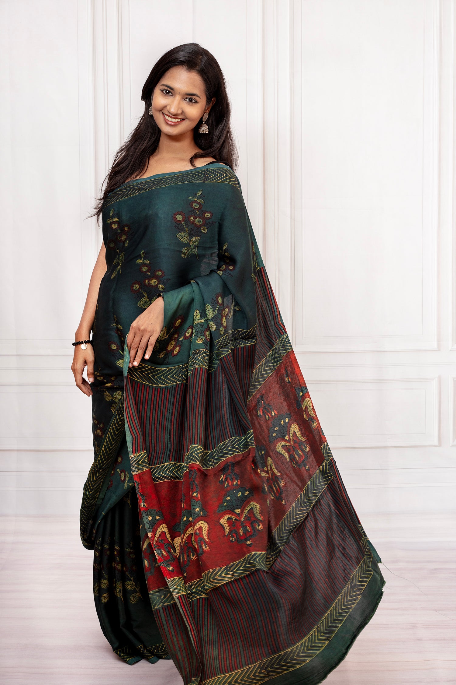 Elegant Handcrafted Dark Green Saree with Intricate Prints
