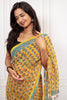 Elegant Mustard  Floral Cotton Chiffon Saree with Rich Blue Borders