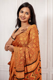 Rust Orange Ajrakh Saree with Bold Pallu Design