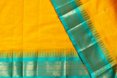 Bright Yellow Silk Cotton Saree with Emerald Green Zari Border