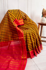 Mustard Checkered Silk Cotton Saree with Vibrant Pink Zari Border