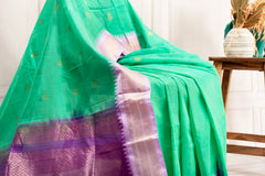 Graceful Green Silk Cotton Saree with Lavender Zari Border & Elegant Detailing