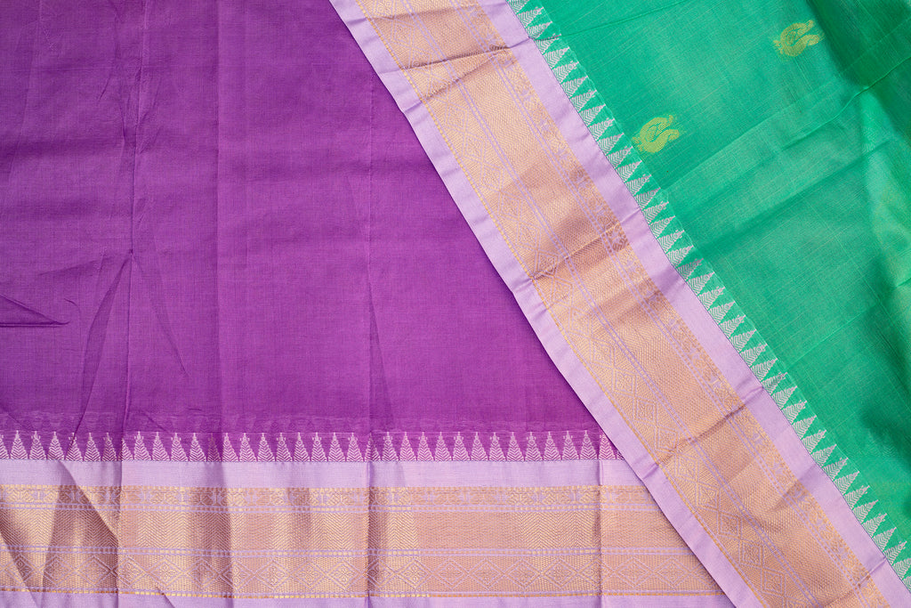 Graceful Green Silk Cotton Saree with Lavender Zari Border & Elegant Detailing
