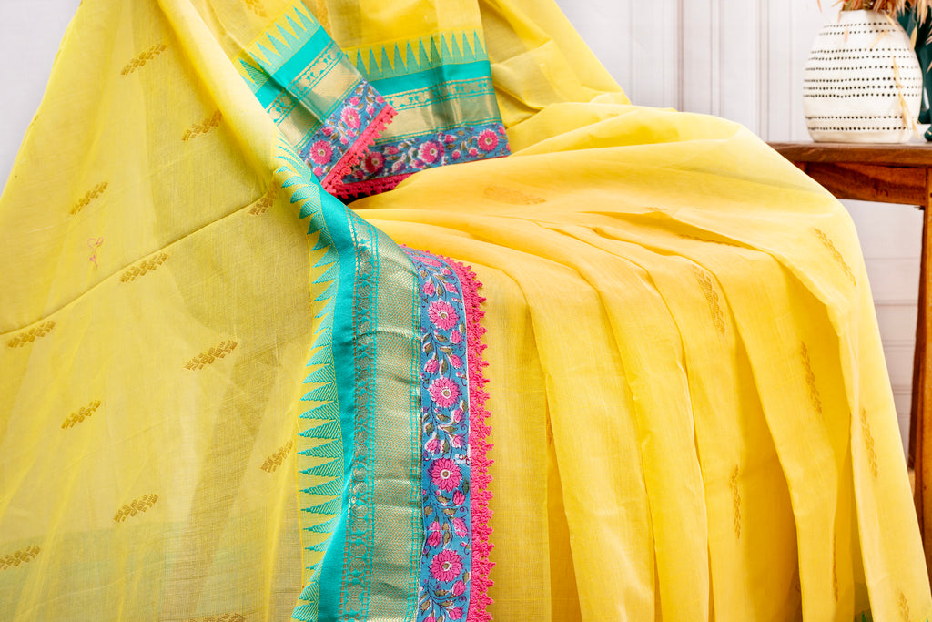 Sunshine Yellow Cotton Saree with Contrast Green Border & Floral Lace Detailing