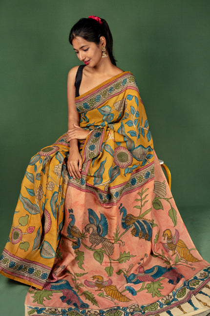 Handcrafted Kalamkari Saree with Majestic Peacock Pallu & Floral Motif Body