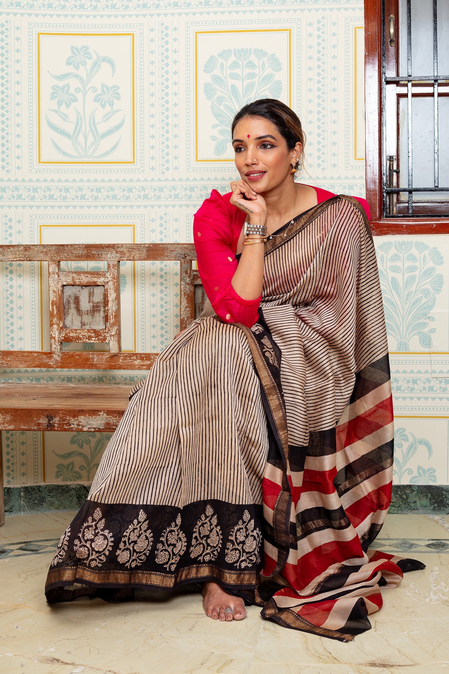 Elegant Striped Maheswari Silk Saree With Floral Border